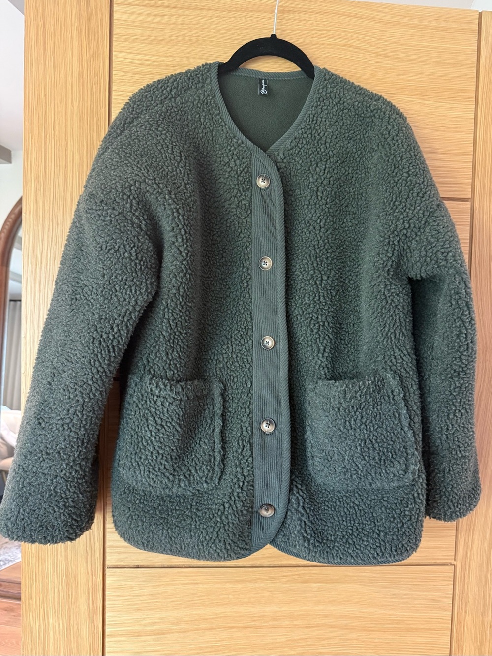 Fleece jacket with corduroy trim